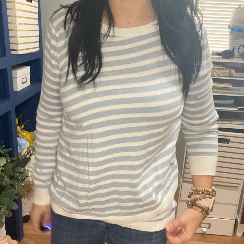 Blue and white striped sweater